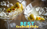 Close-up of martinis with olives on cocktail picks