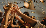 People toasting wine glasses