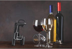 Coravin, 2 wine glasses and 2 bottle of wine on the table