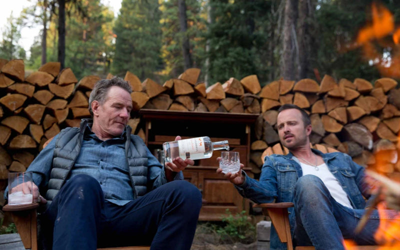 Bryan Cranston and Aaron Paul with a bottle of Don Hombres