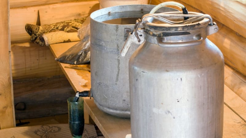 Moonshine stills on a wooden bench