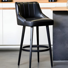 black leather bar stool with back in a home bar setting